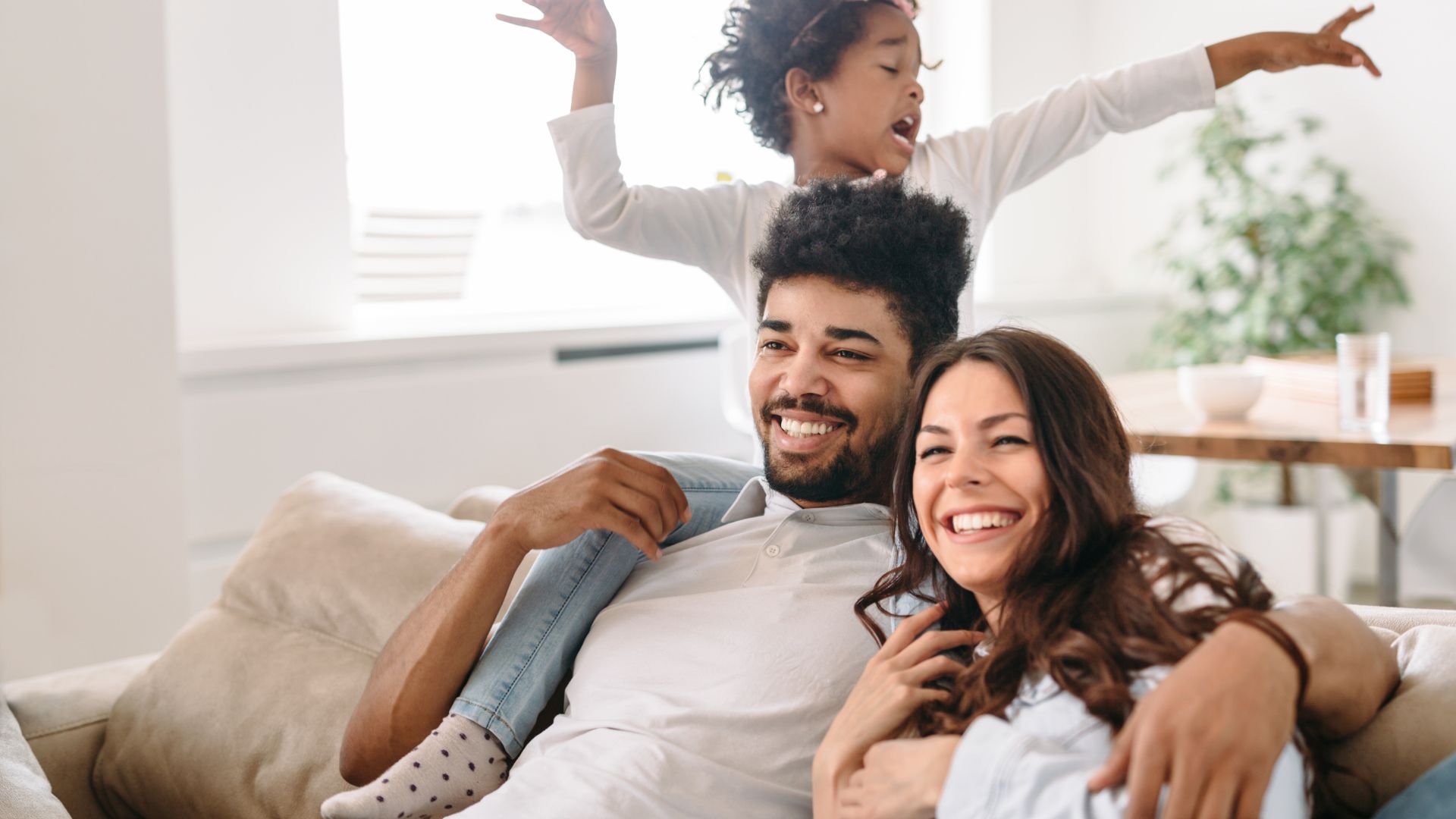 Family happy with financing for HVAC services of Alpha Heating and Air in Bandon.