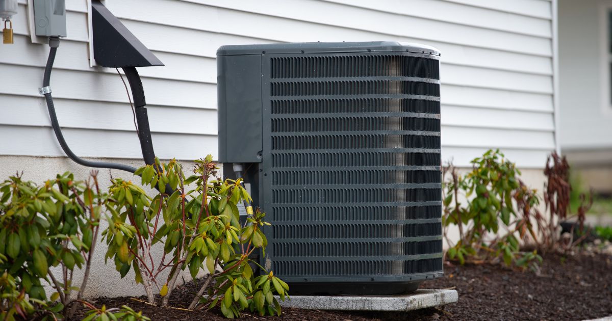 Outdoor air conditioning unit exposed to weather elements, being at risk of corrosion over time.