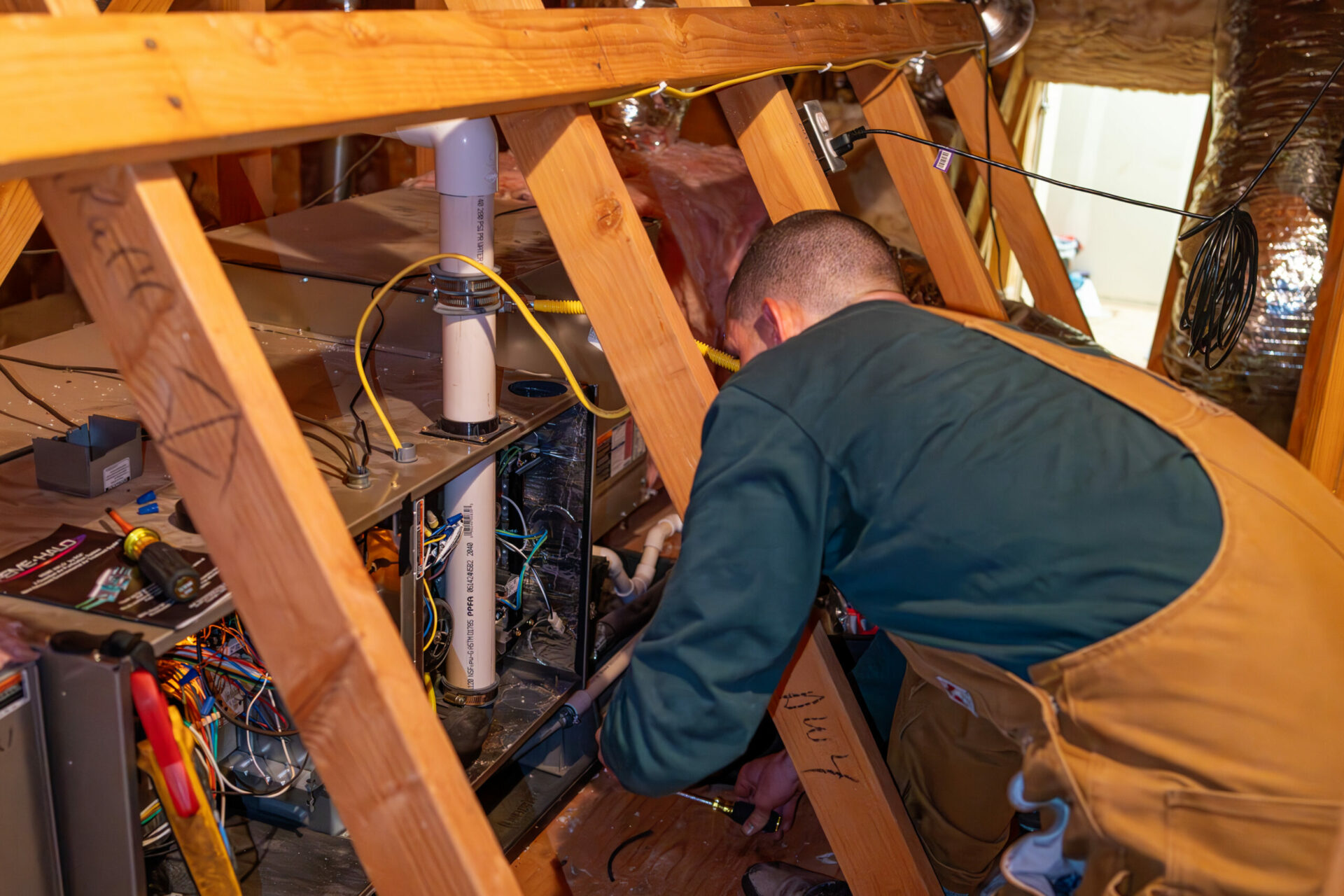 Technician repairing a short cycling furnace in Bandon home.